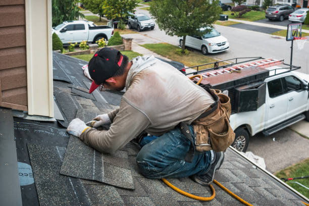 Professional Storm Damage Roof Repair technician working in Burkittsville, MD